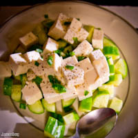 Soft tofu and cucumber salad with scallions and sesame oil